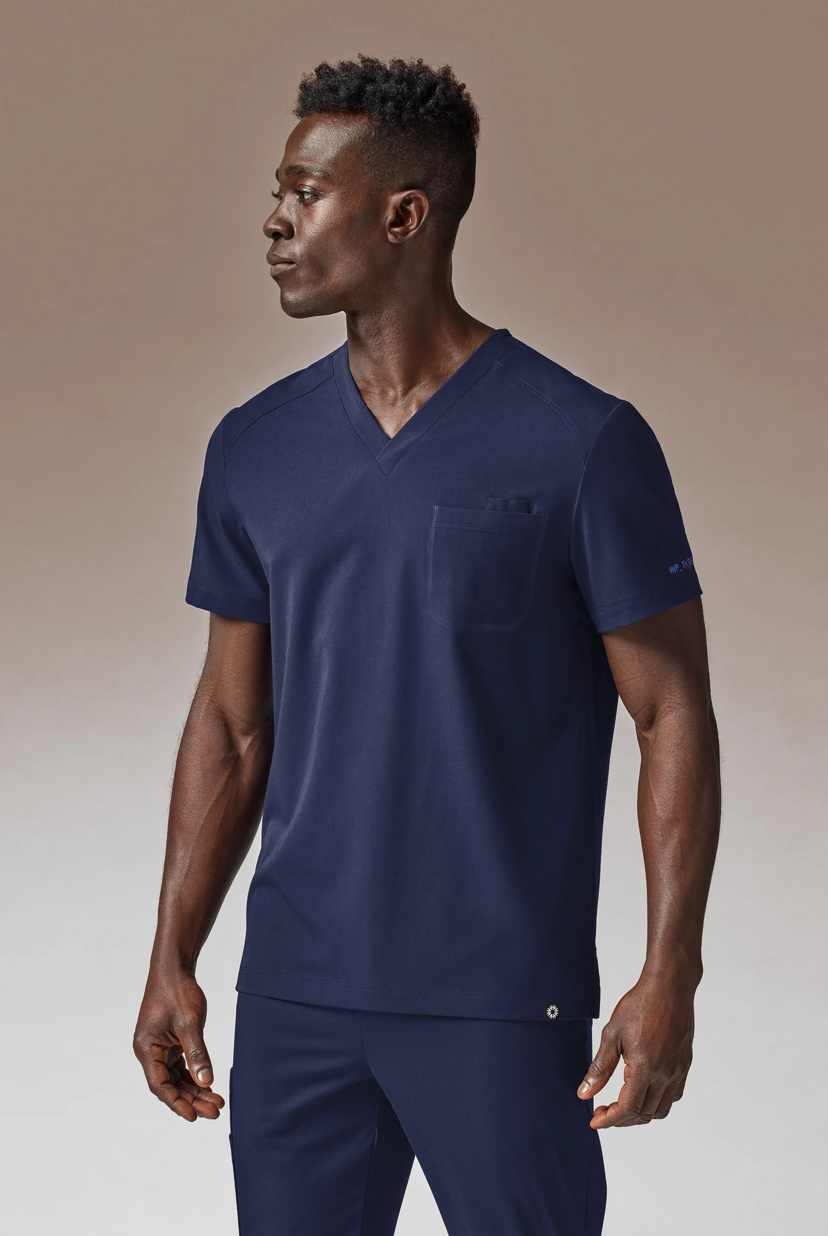 Hypothesis System Men’s 3-Pocket V-Neck Tuck In/Wear Out Scrub Top