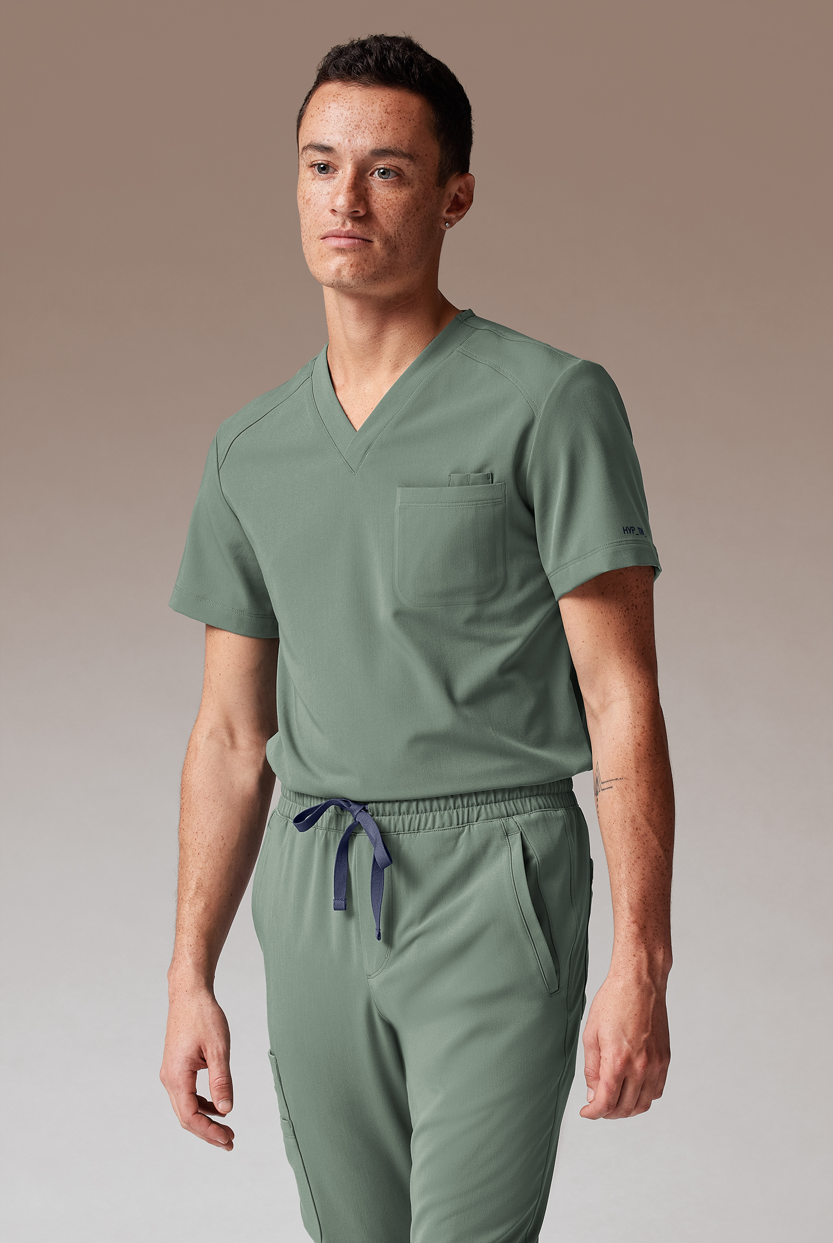 Hypothesis System Men’s 3-Pocket V-Neck Tuck In/Wear Out Scrub Top