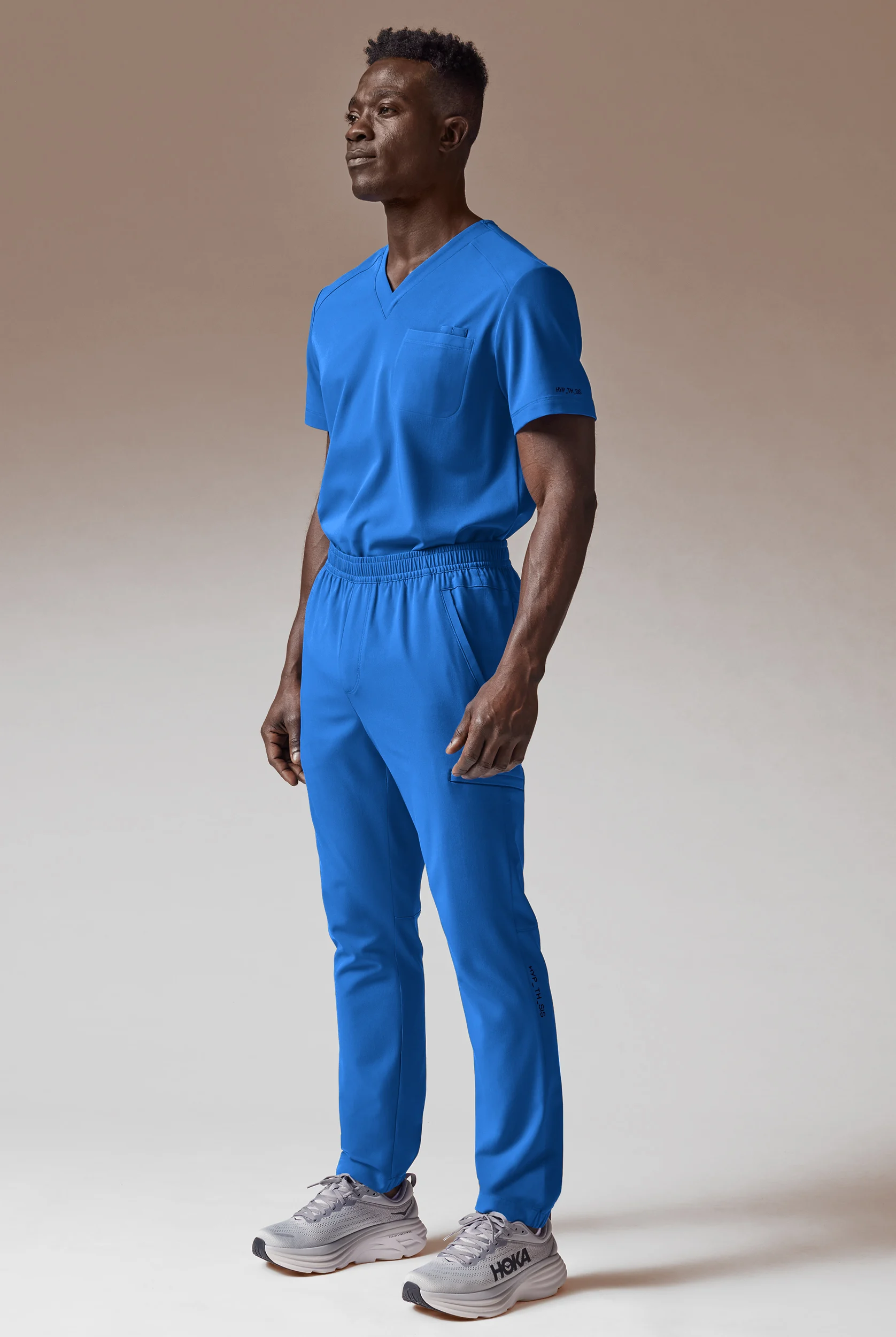 Hypothesis System Men&rsquo;s 3-Pocket V-Neck Tuck In/Wear Out Scrub Top