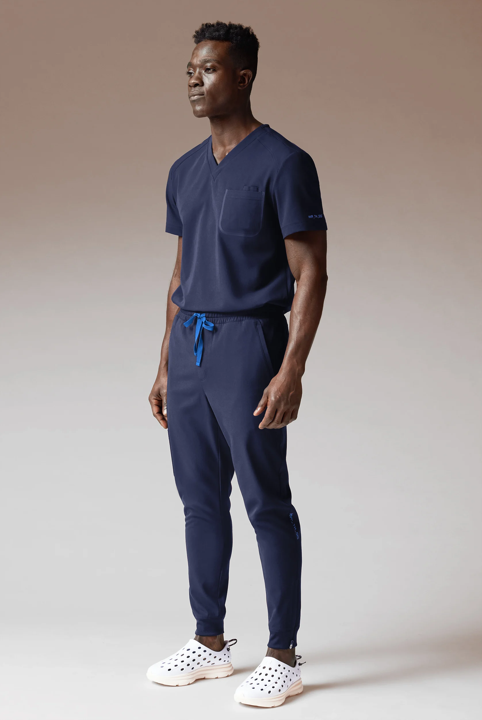 Hypothesis System Men’s 3-Pocket V-Neck Tuck In/Wear Out Scrub Top